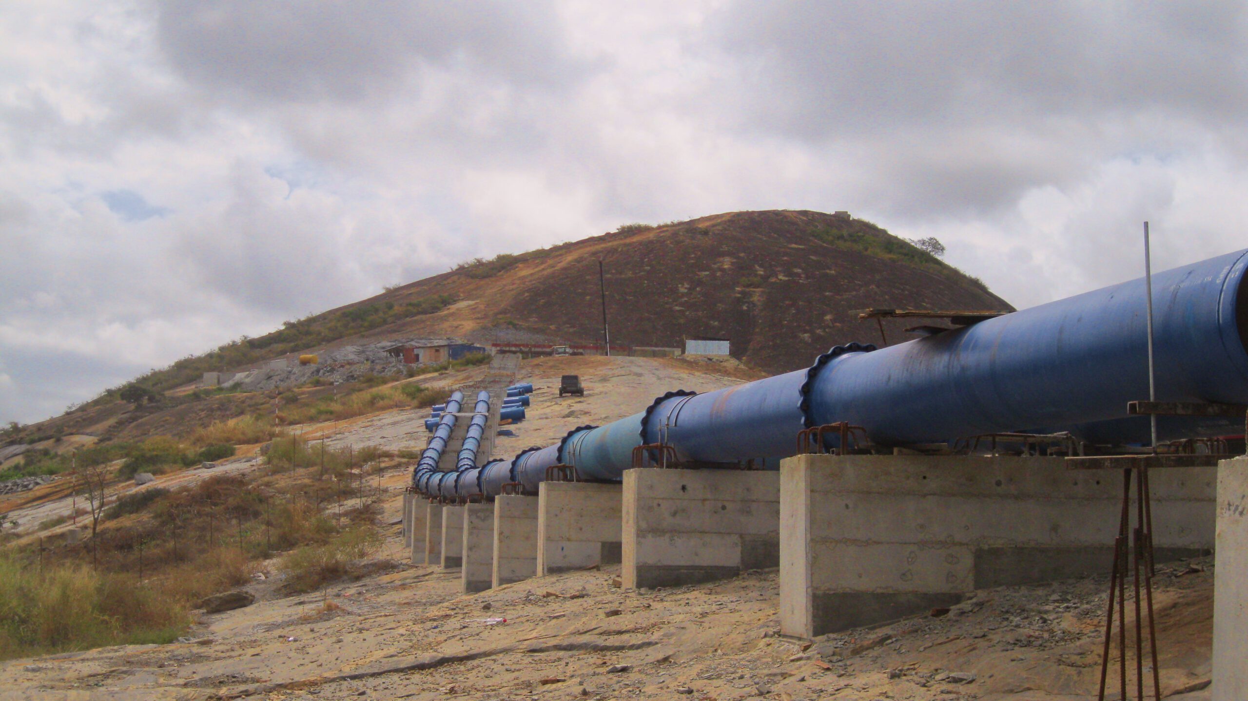 Large Water Pipes going Up Hillside in Mozambique