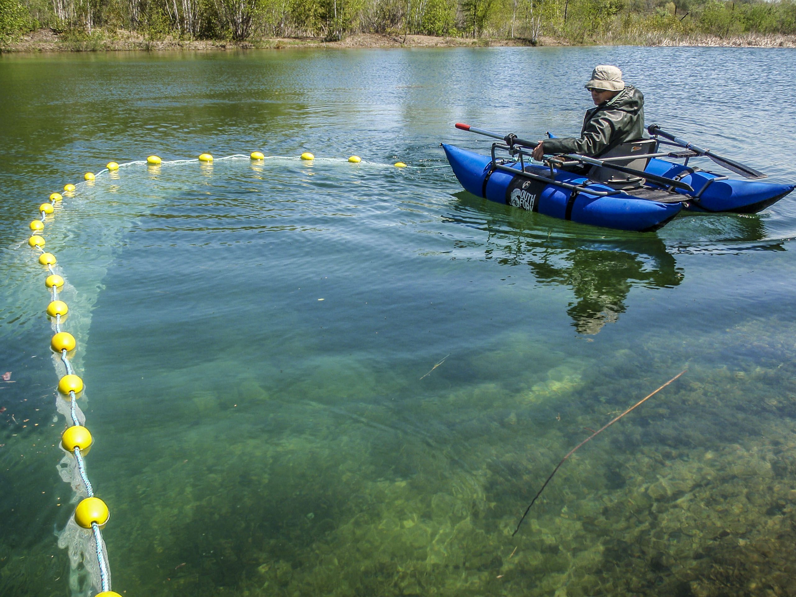 Pontoon Boat in Lake doing Environmental Assessment