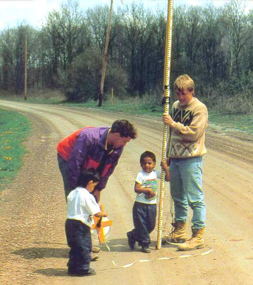 John Burnside and Kids on Roadway in Indigenous Community