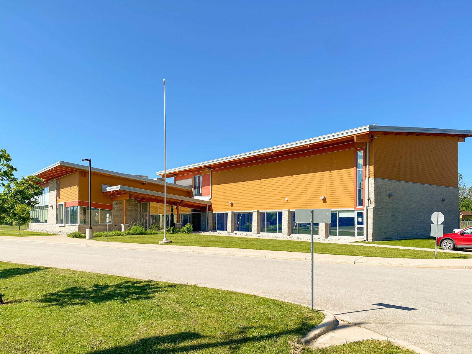 Tan Coloured Building with Driveway