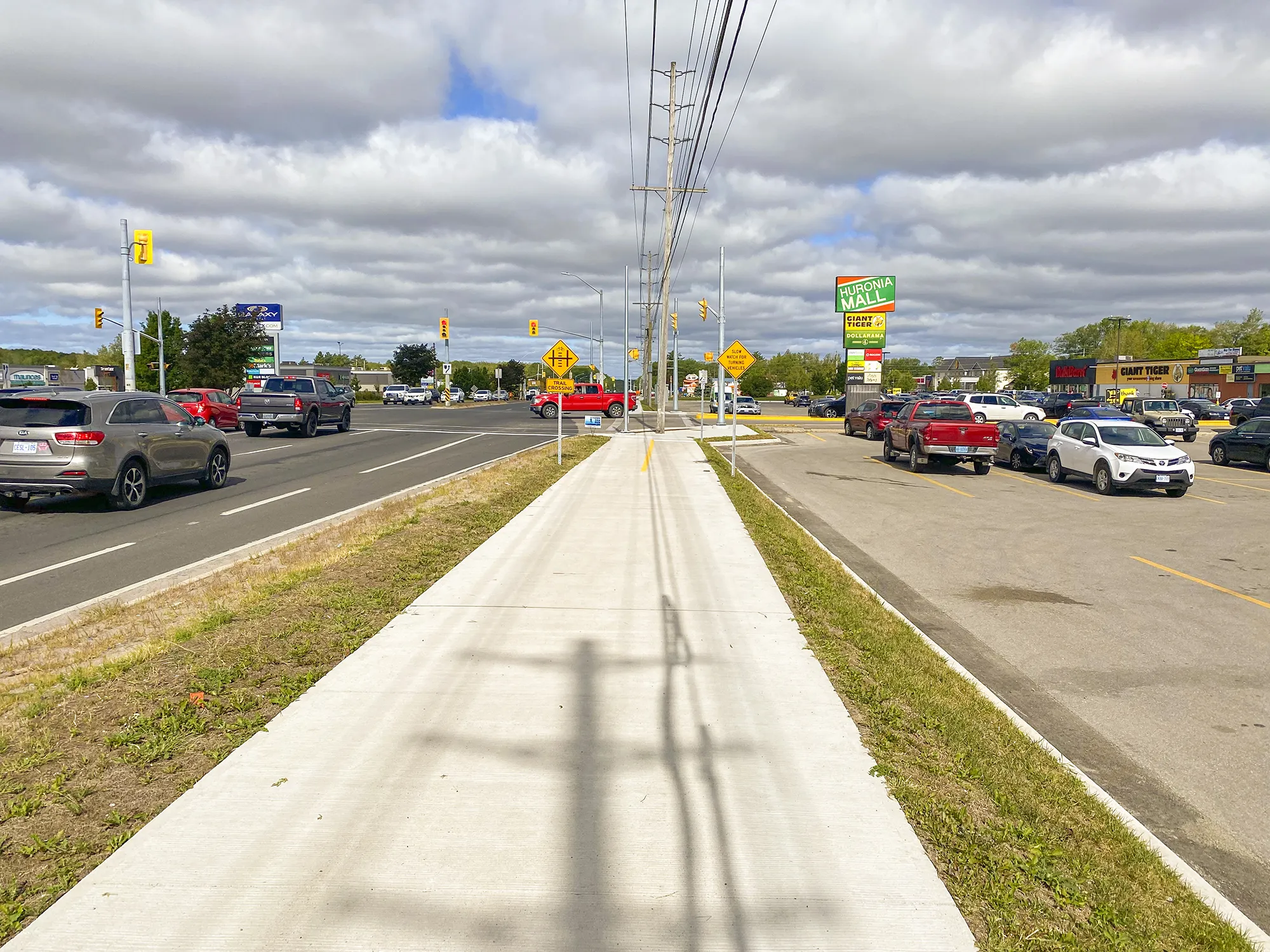 Simcoe County Road 93 on new sideway looking towards intersection