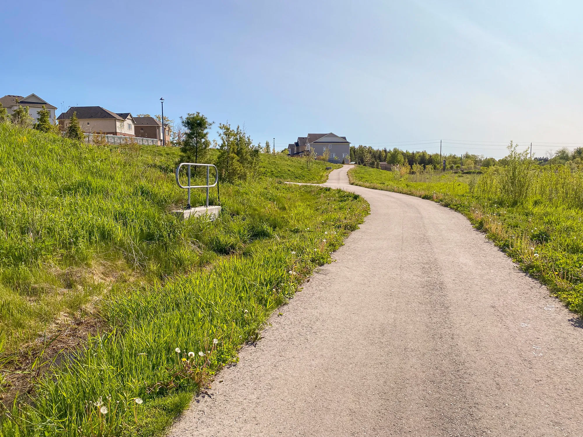 Sorbara Nigus Development - walking path beside subdivision and drainage ditch